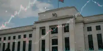 Federal Reserve building with rising interest rate graph overlay