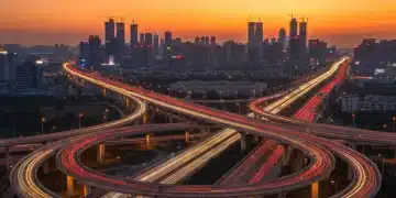 Modern highway infrastructure with city skyline at sunset, representing federal investment